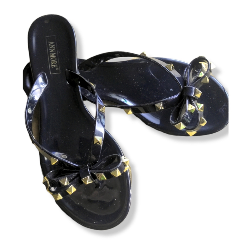 Black jelly Ann More flip flop sandals with pretty bow and gold studs